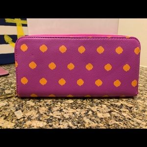 purple wallet with polka dots